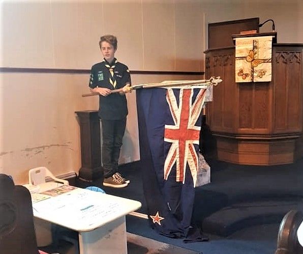 Owairaka Sea Scouts lowering and raising the flag